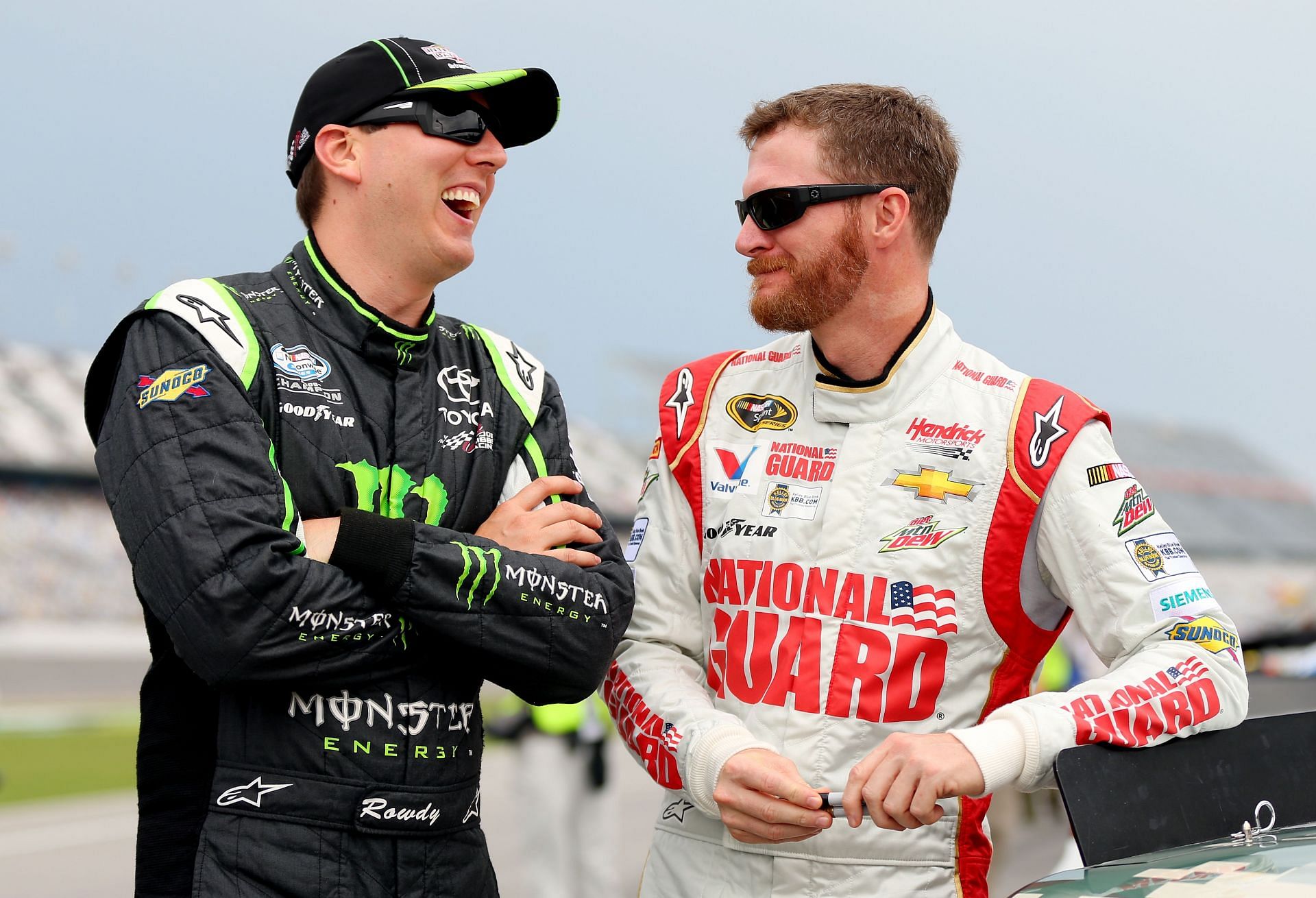 Kyle Busch (L) and Dale Earnhardt Jr., during the NASCAR Sprint Cup Series Coke Zero 400. Source: Getty